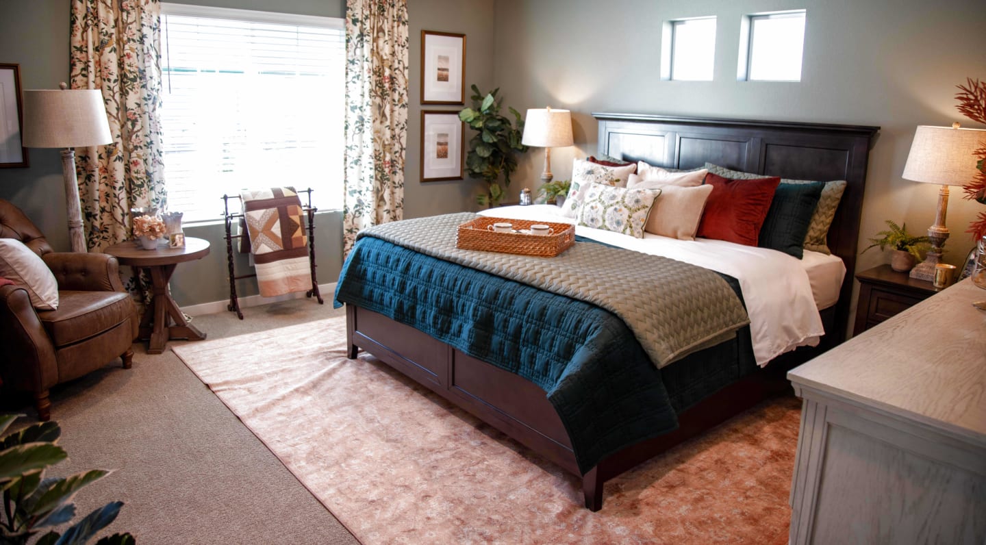 The Bering Panel Bed in a sage colored bedroom