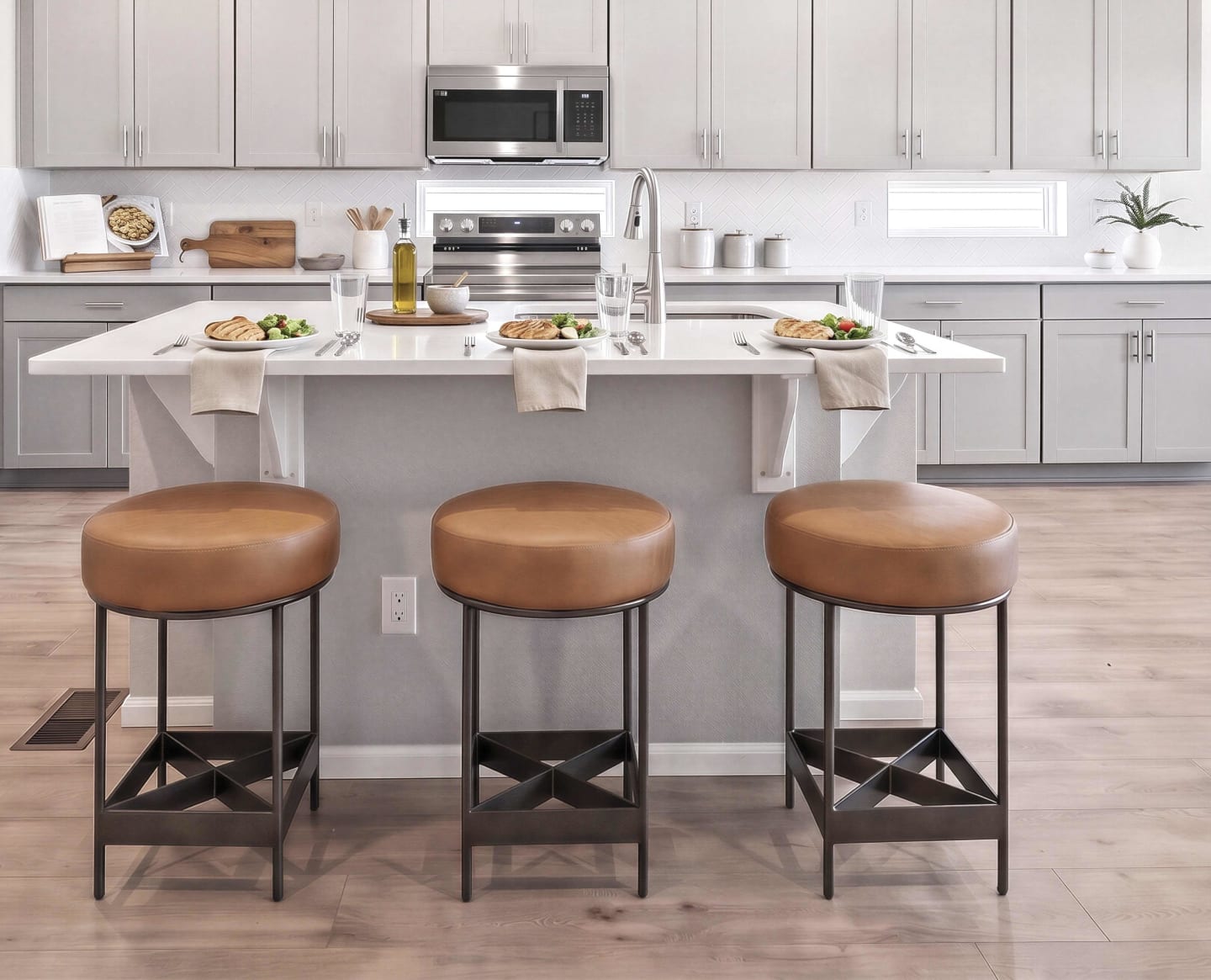 Kitchen island in St. Jude Dream Home with leather bar stools