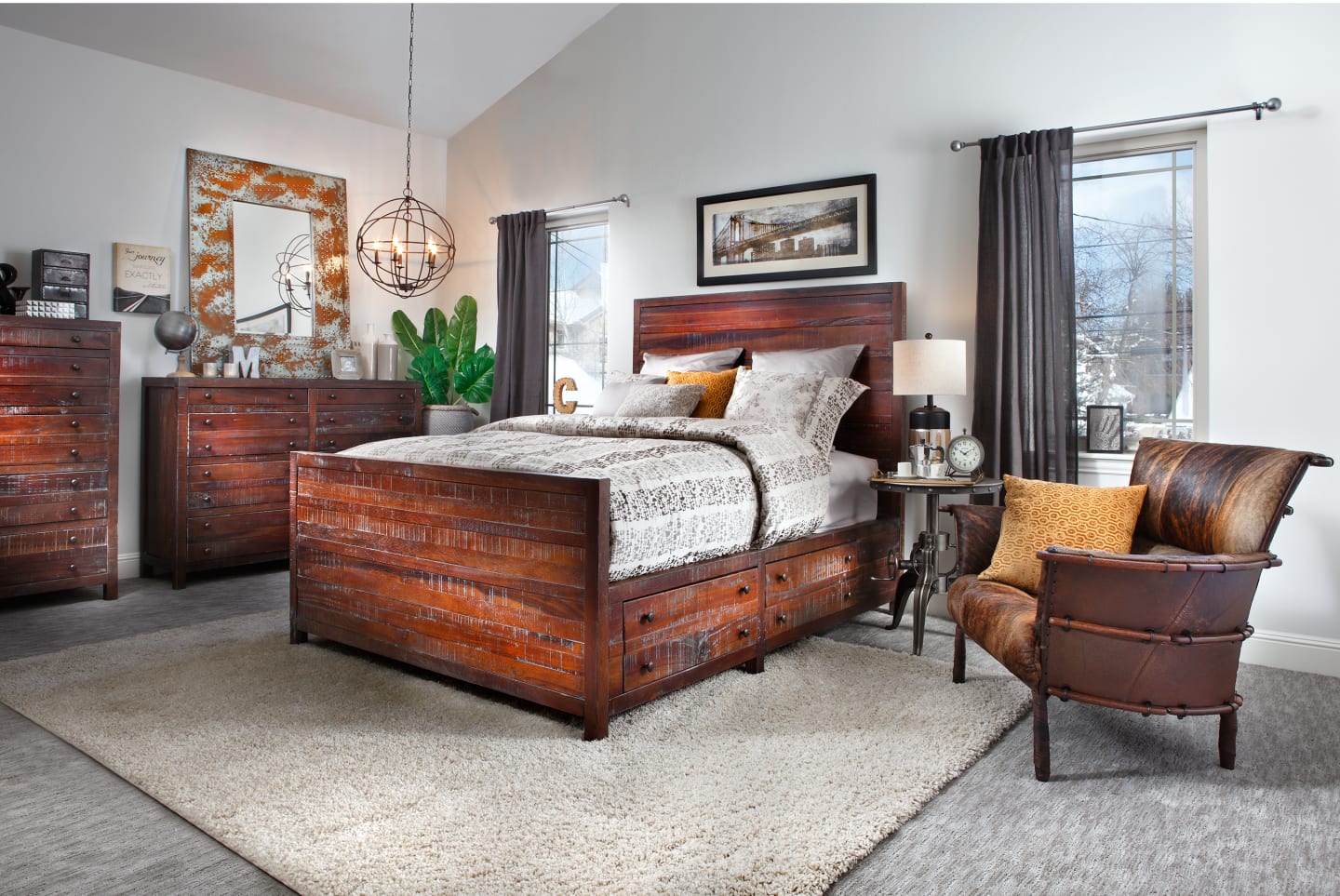 A bedroom group made from reclaimed wood and storage drawers in a bedroom