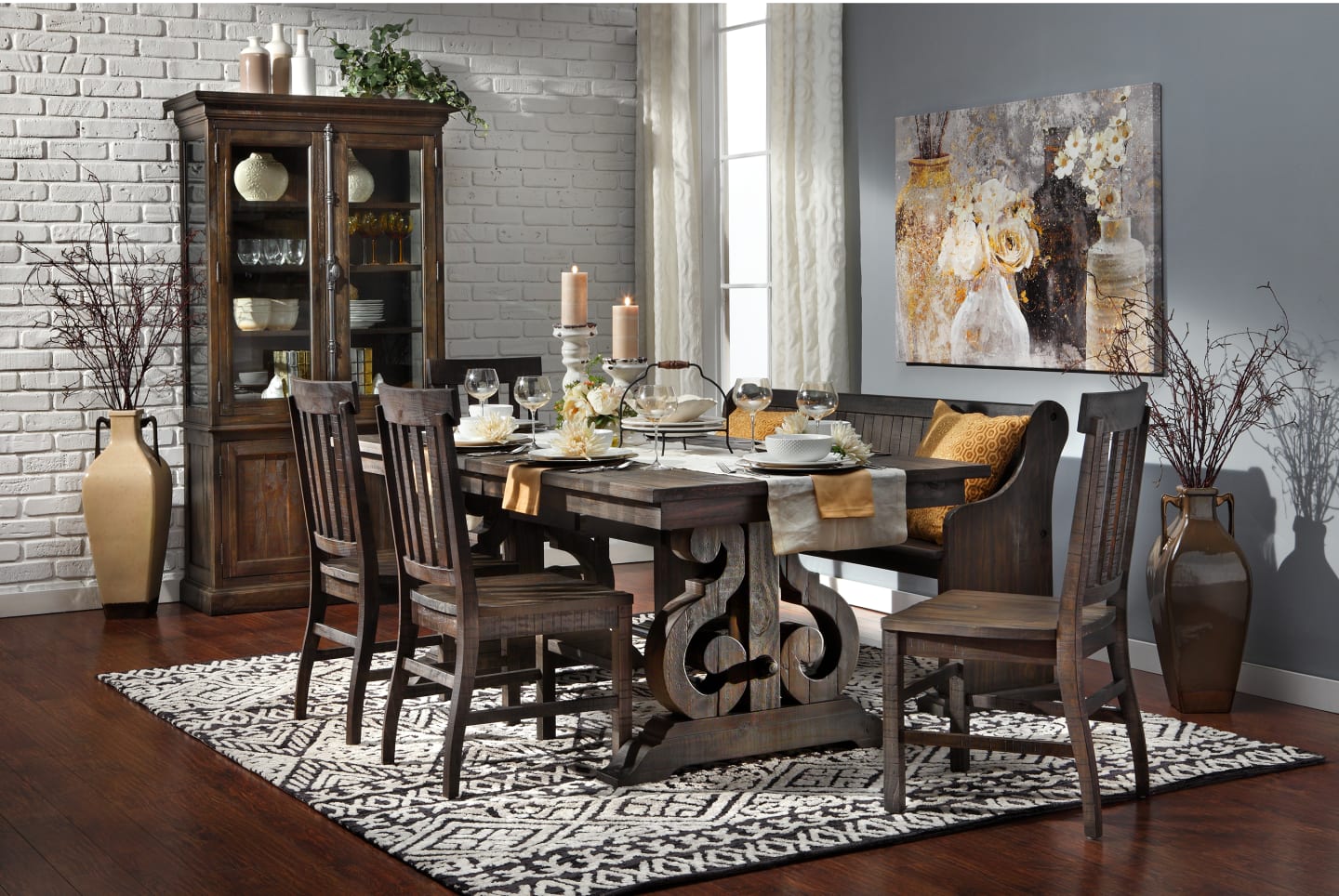A think wood dining set with a traditional trestle table and four slat back side chairs in a dining room
