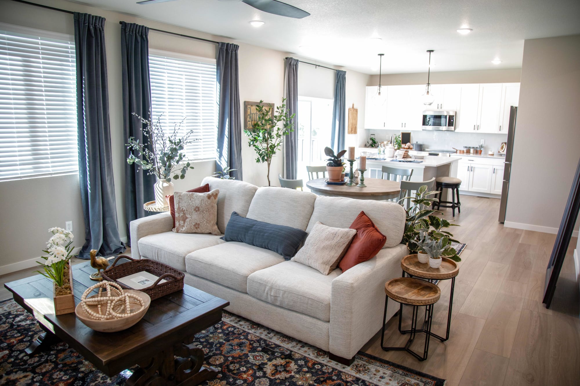 The Hudson Sofa in a large living room with dining nook