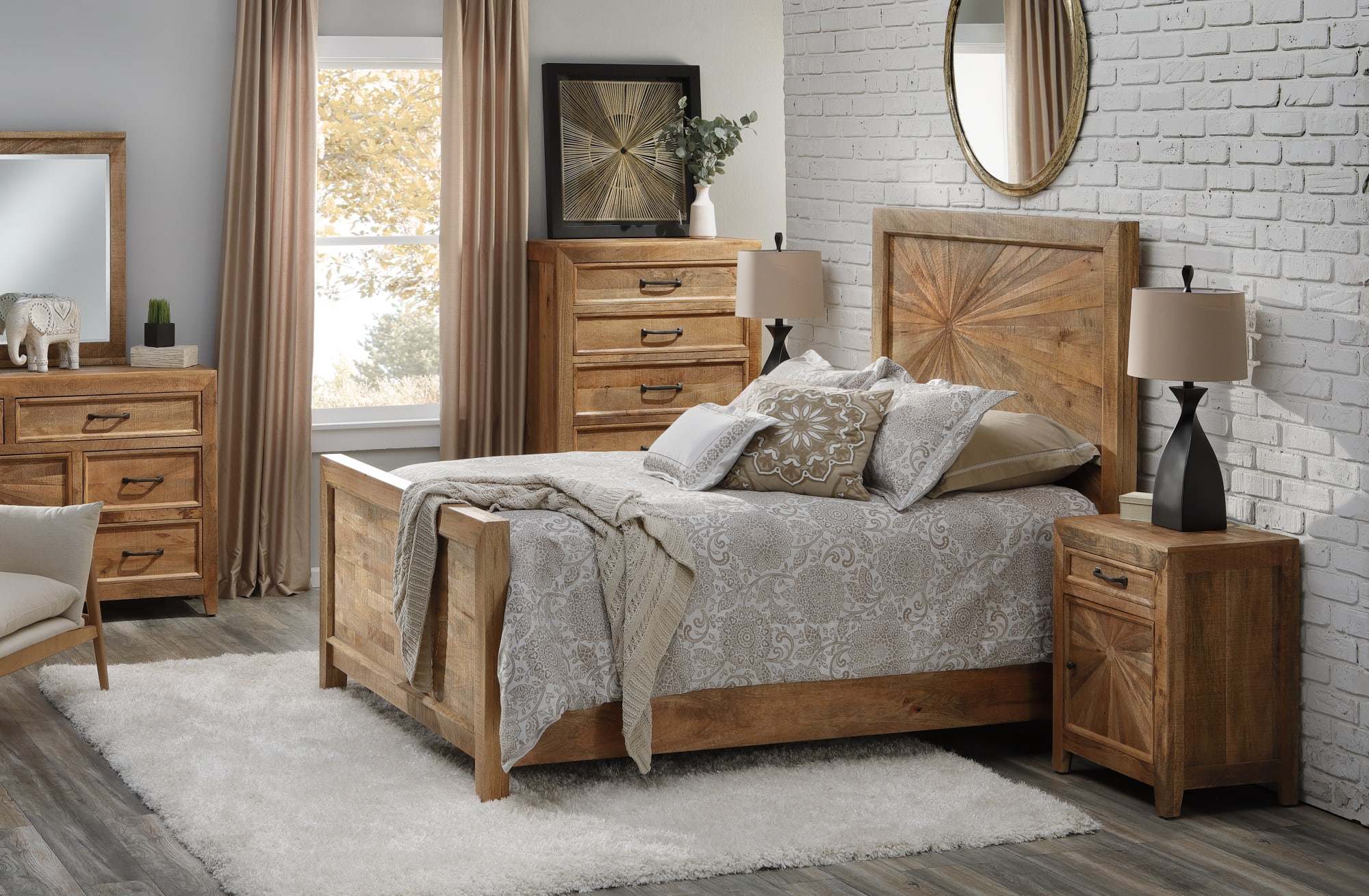 Warm rustic wood panel bed with sunburst inlay accompanied by matching dresser, mirror, nightstand, and drawer chest in bedroom window scene