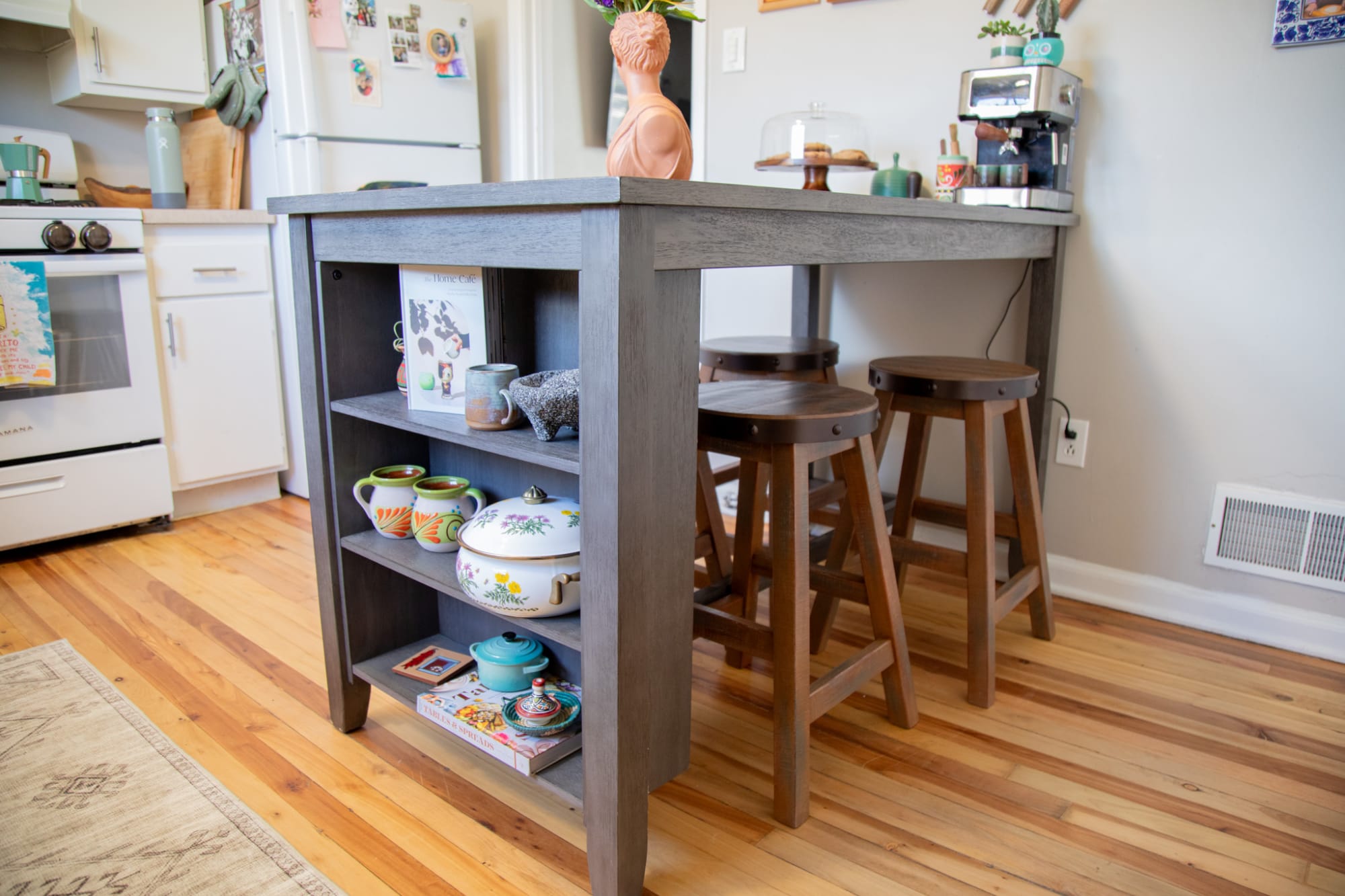 The Timber Dining Table styled in home kitchen as a multipurpose dining table and workspace