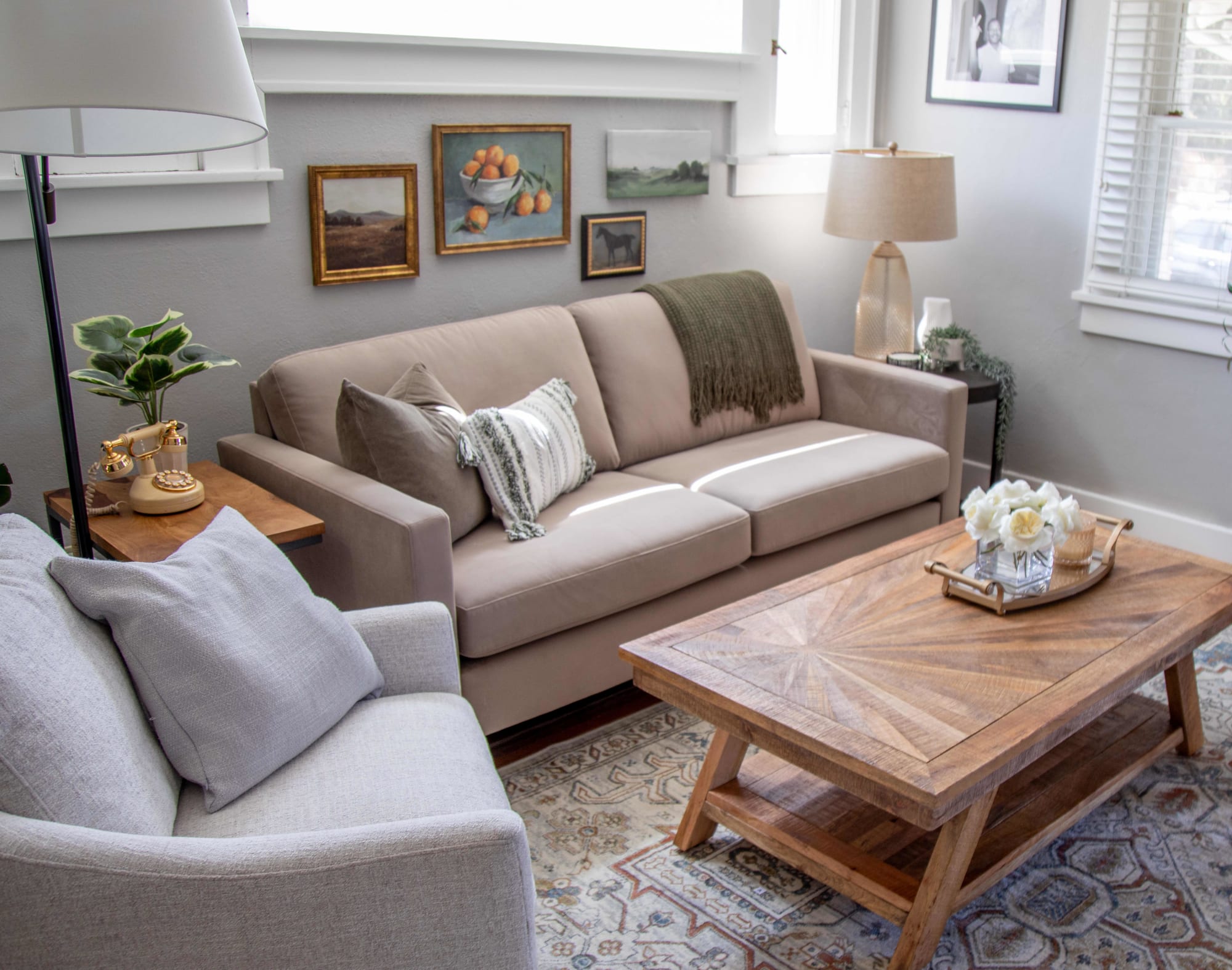 The Nouvelle Sofa in a living room with accent chairs