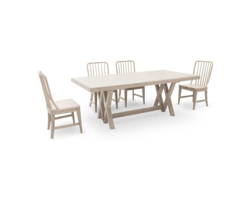 A whitewashed wood dining set