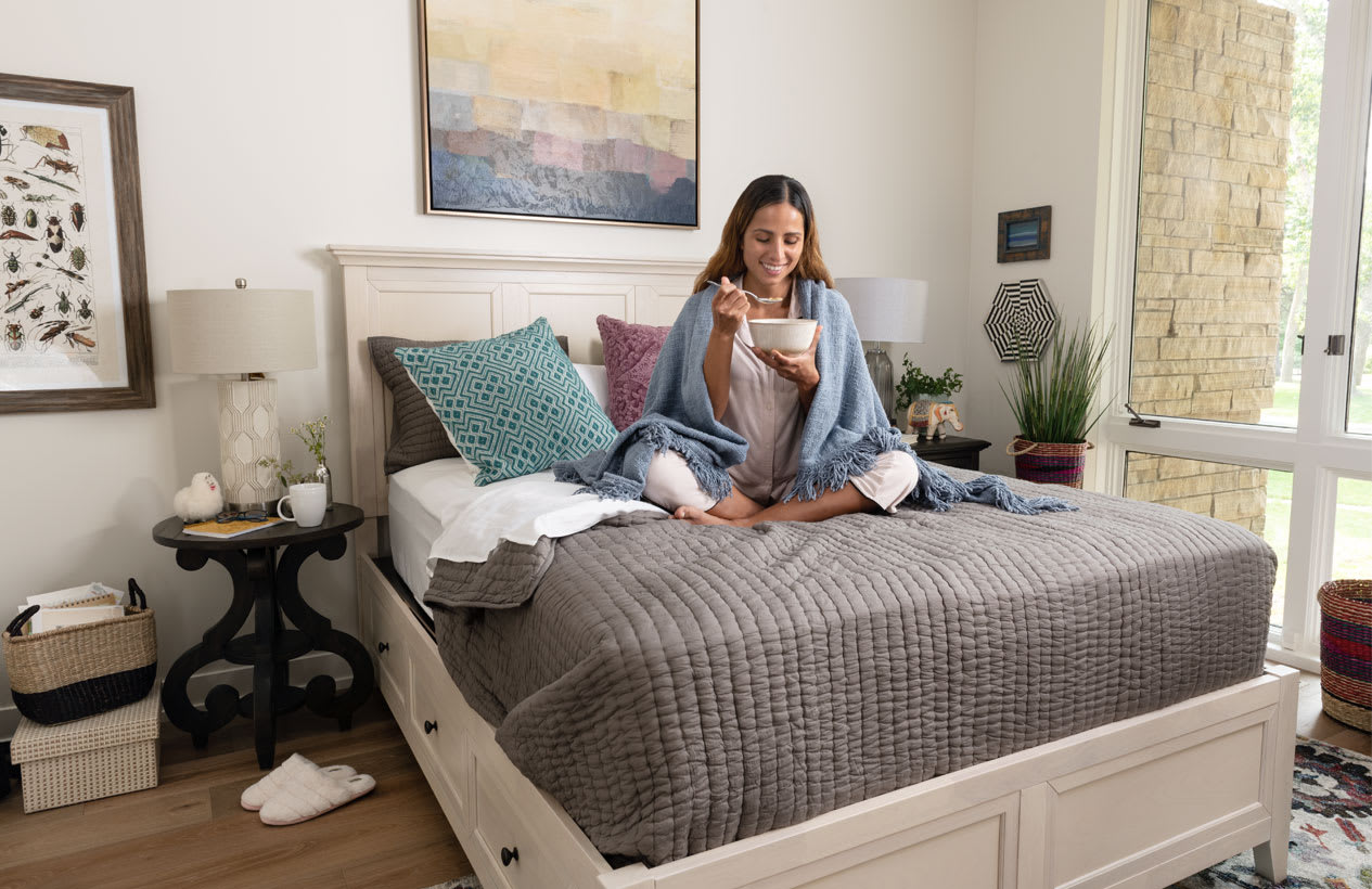 Cream Colored Storage bed frame in bedroom