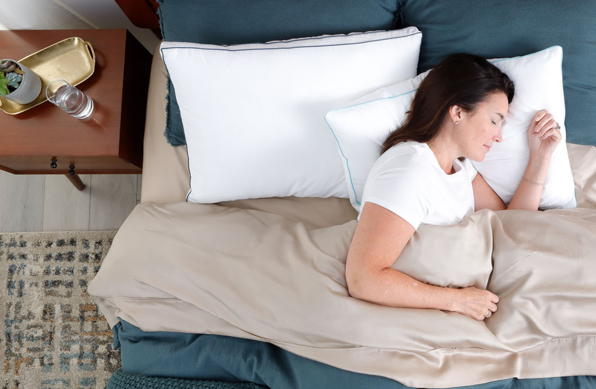 Woman Sleeping Peacefully on Doctors Choice Pillows