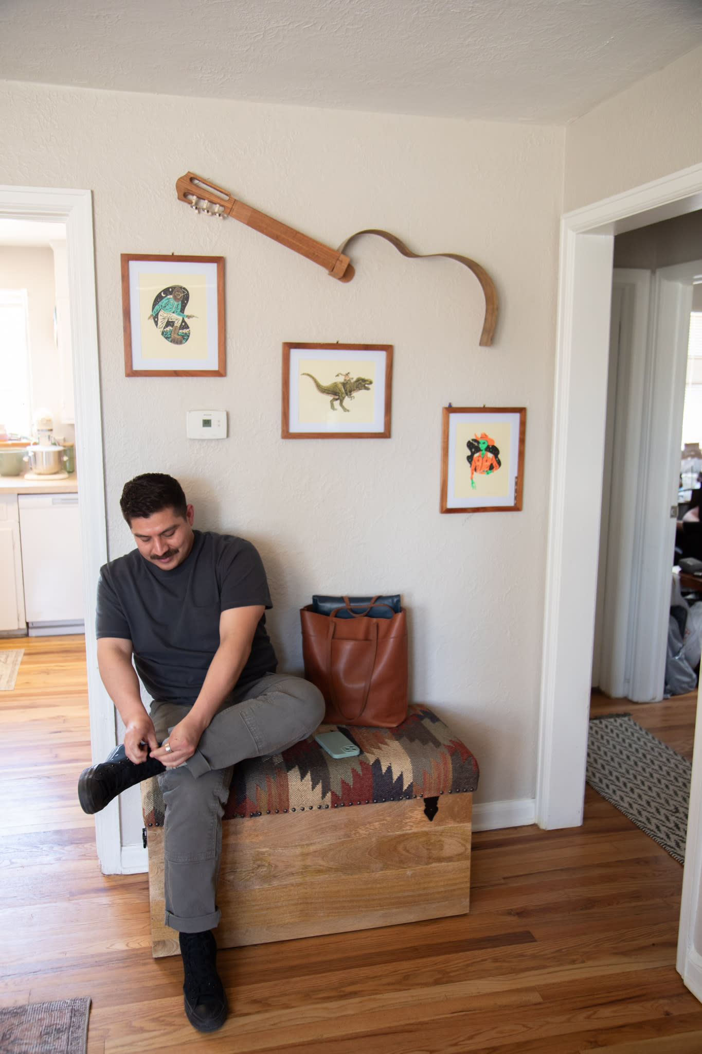 Furniture Row employee using Kilim Chests