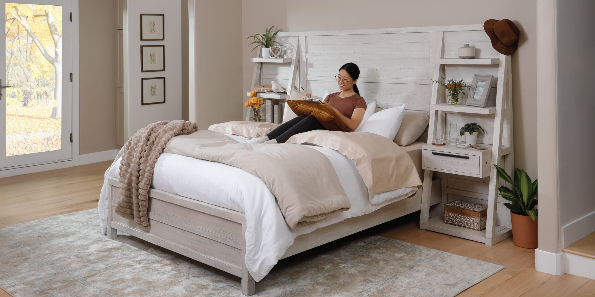 Woman Journaling in Minneapolis bed.