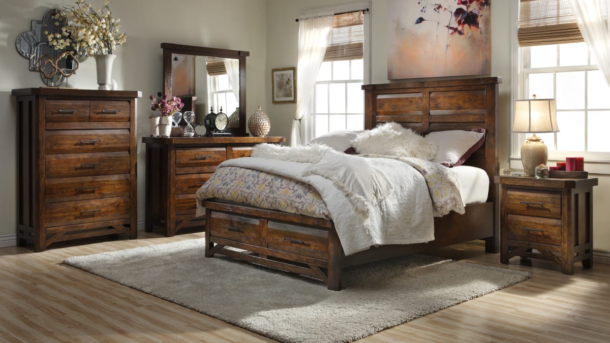 Rustic wood bedroom set featuring a panel bed, nightstand, dresser with mirror, and tall chest in a bedroom window scene
