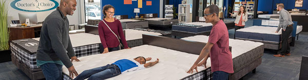 family of four shopping at Denver Mattress