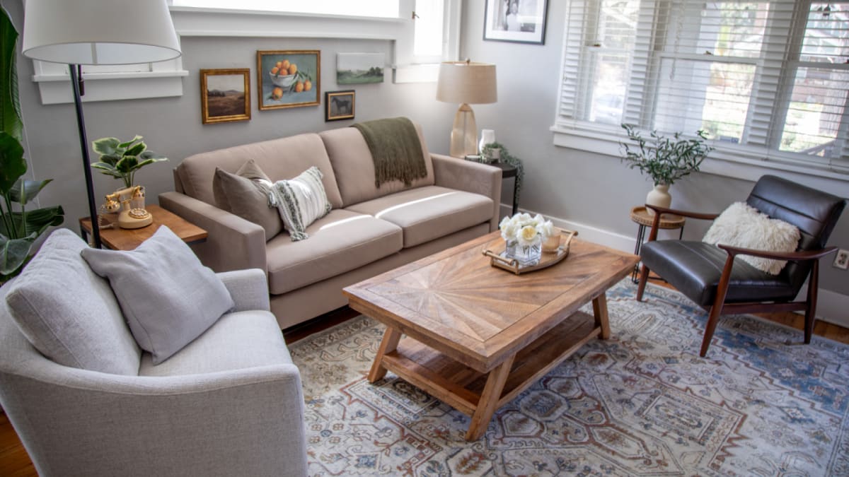 The Nouvelle Sofa in a living room with accent chairs