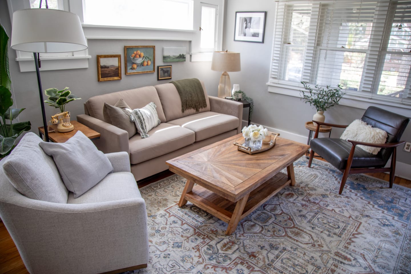 The Nouvelle Sofa in a living room with accent chairs