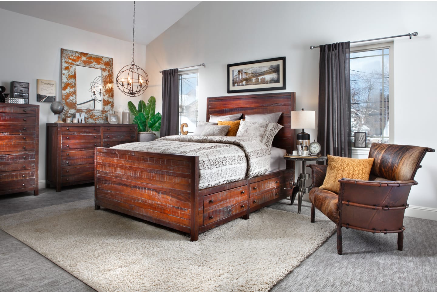 A bedroom group made from reclaimed wood and storage drawers in a bedroom
