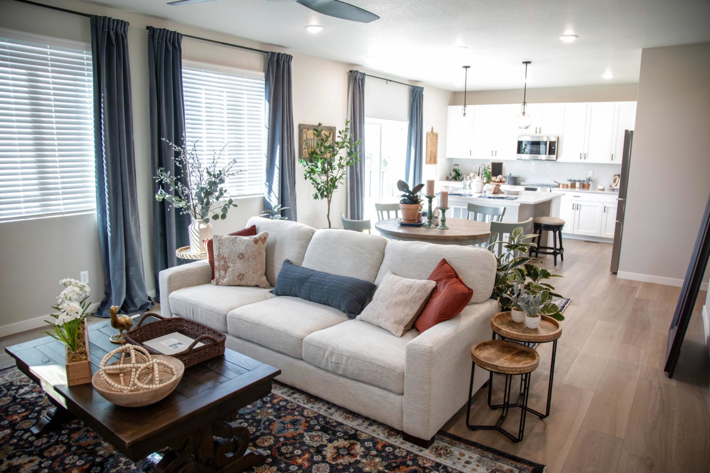 The Hudson Sofa in a large living room with dining nook