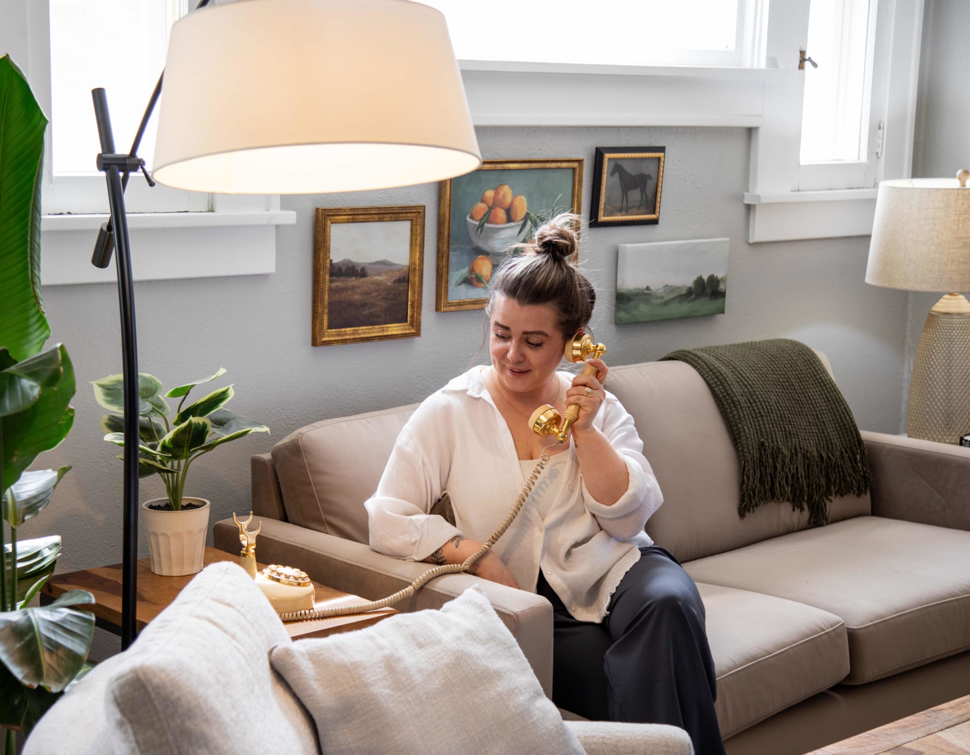 Real Spaces host, Haley, sitting on the Nouvelle sofa
