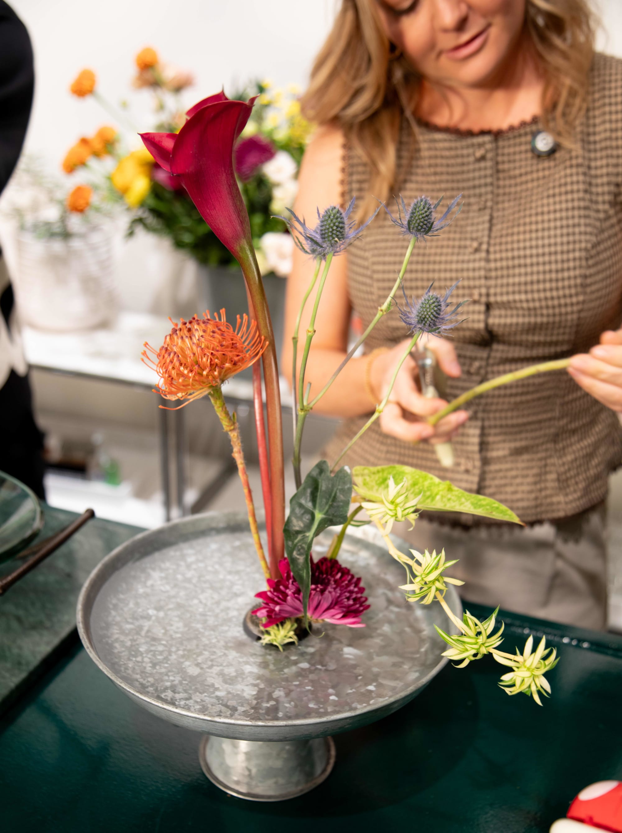 An ikebana flower arrangement on a bowl