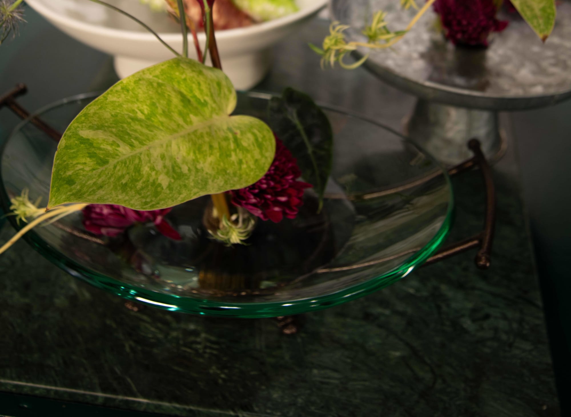 Ikebana flower arrangements in bowls
