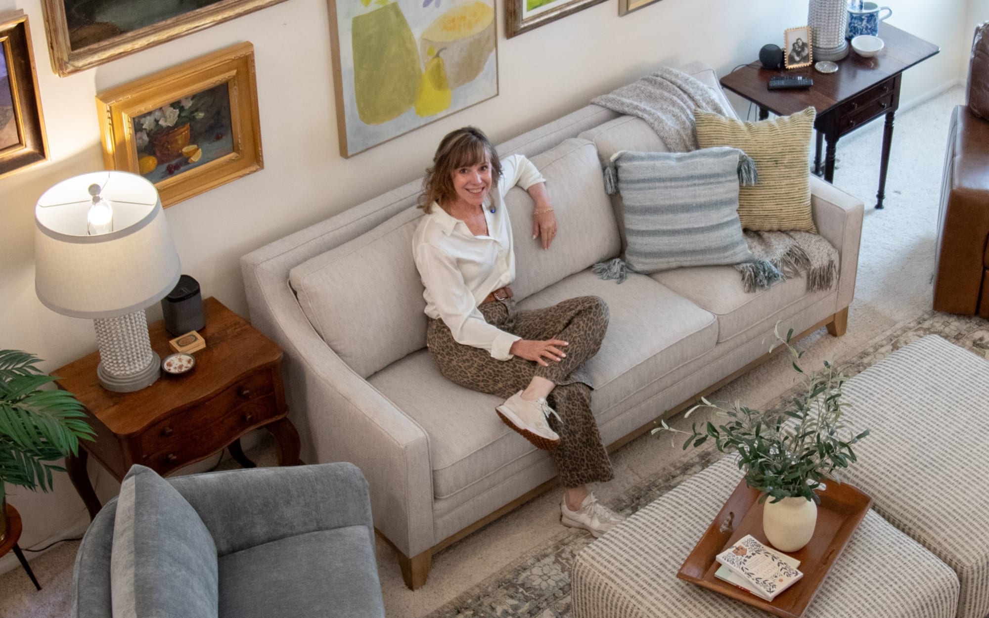 Amy posed for Real Spaces on the Delray Sofa styled in her living room