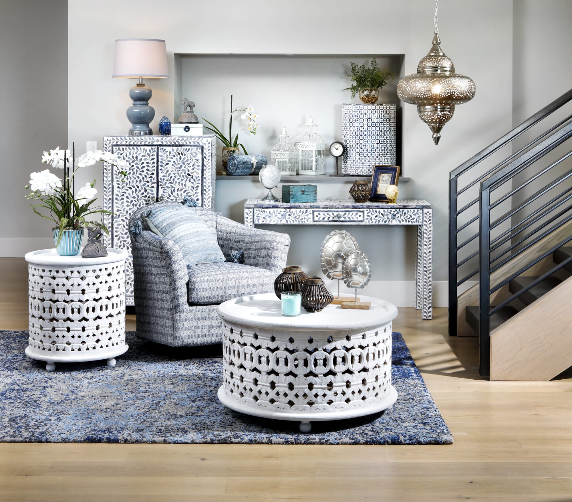 Blue and white seating area near staircase