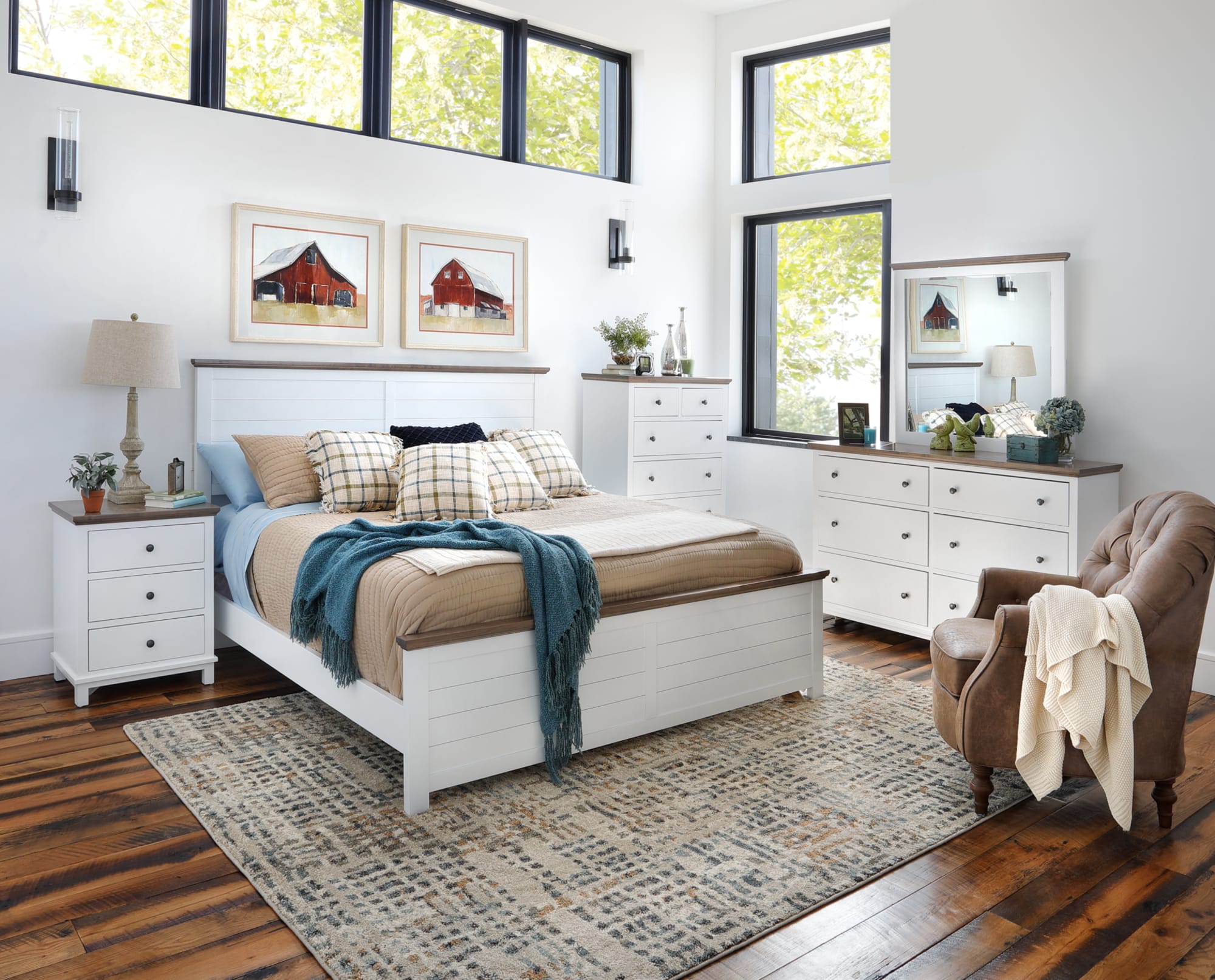 Pleasant Hill Bedroom. White bedroom set with brown wooden table tops and accents. Paneled headboard.