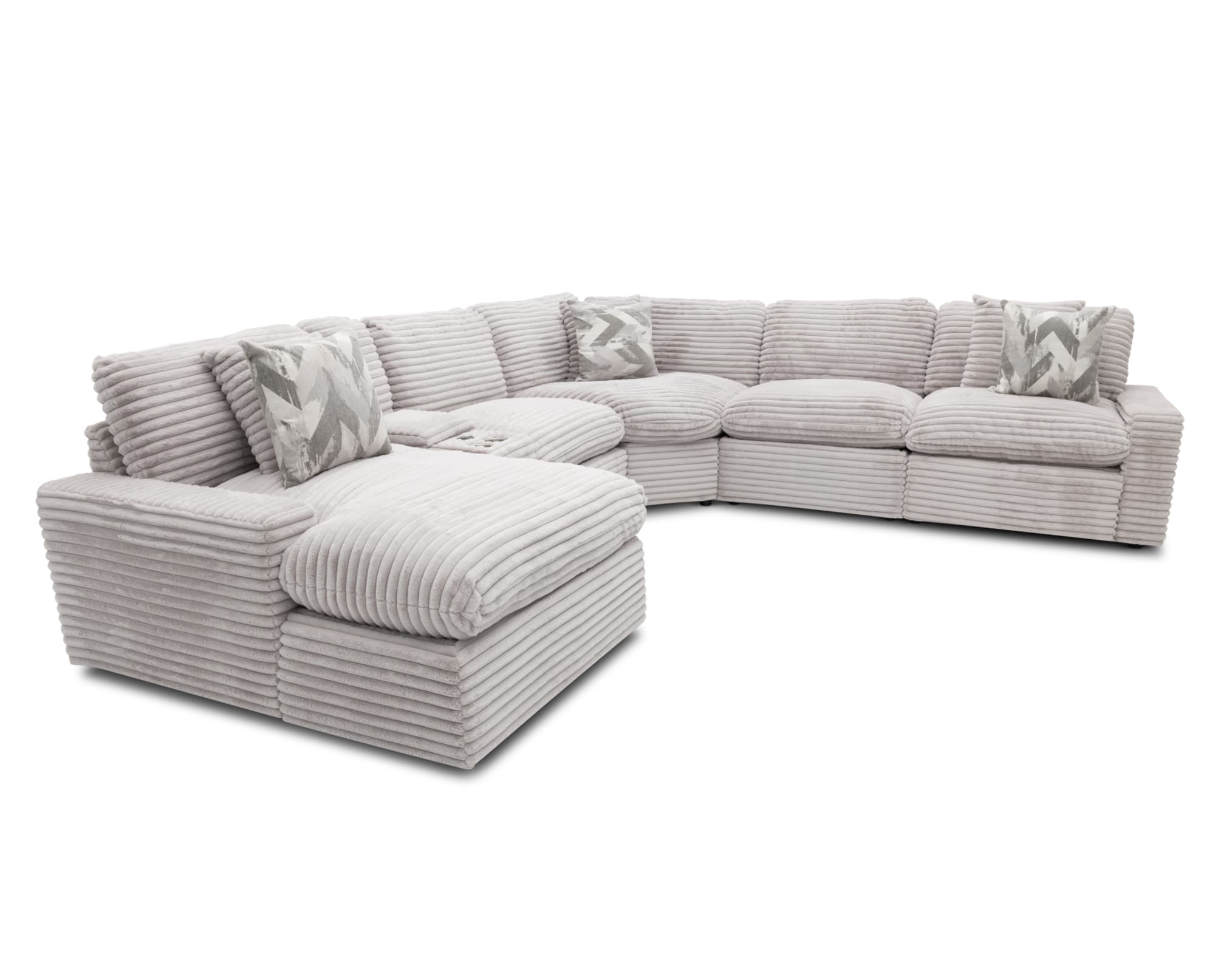A large channeled sectional, the Kokomo 6 Pc Chaise Sectional, on an all white background