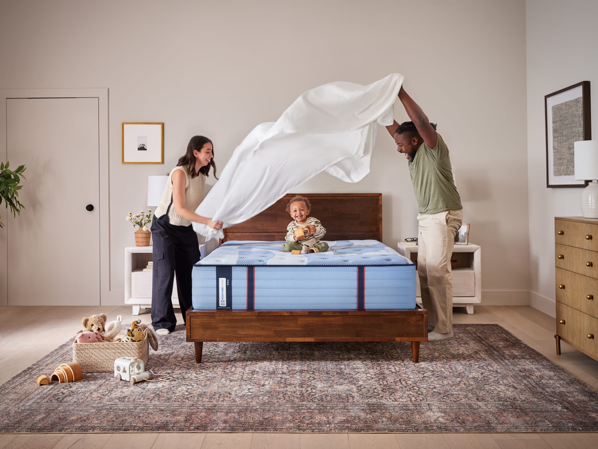 Human and Animal Actors Laying on Sealy Mattresses