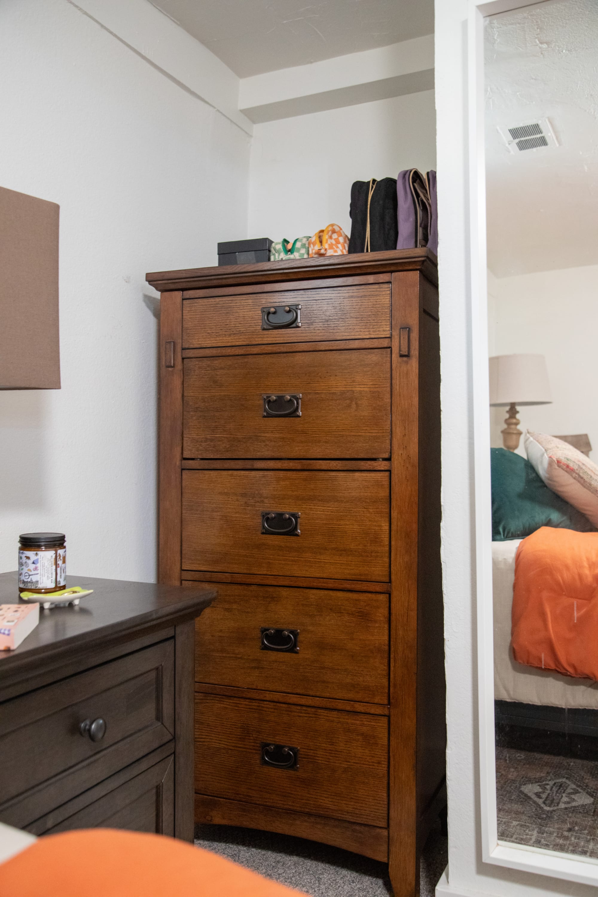 The Cristo Lingerie Chest styled in a nook of Mackinley's apartment bedroom