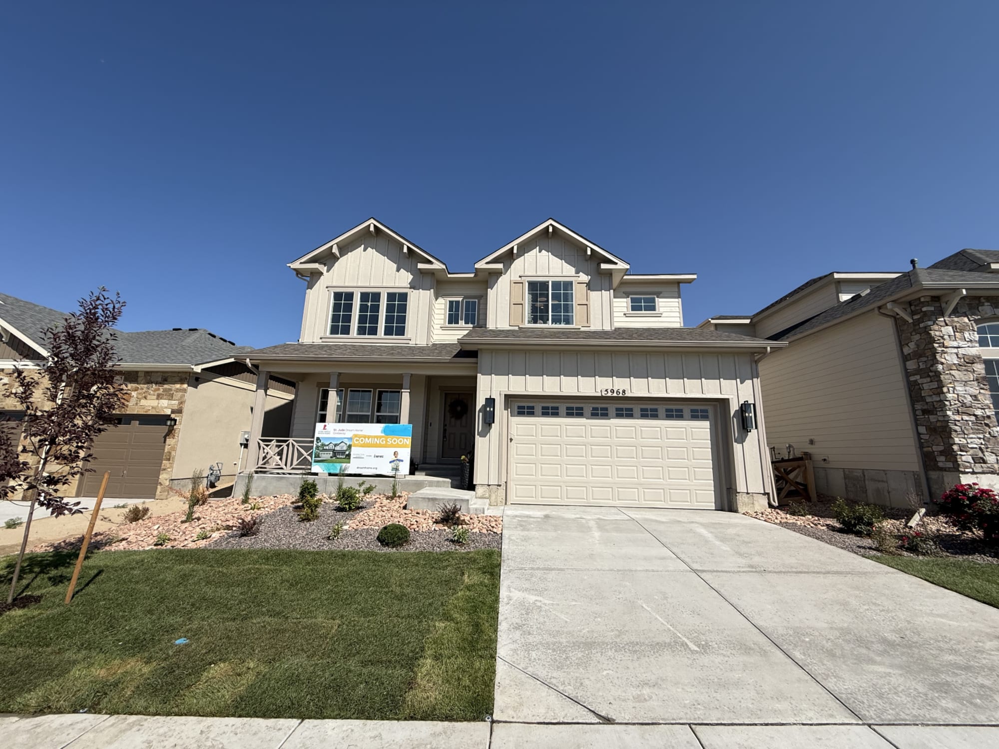 The St Jude Dream House in Colorado Springs with lawn and driveway