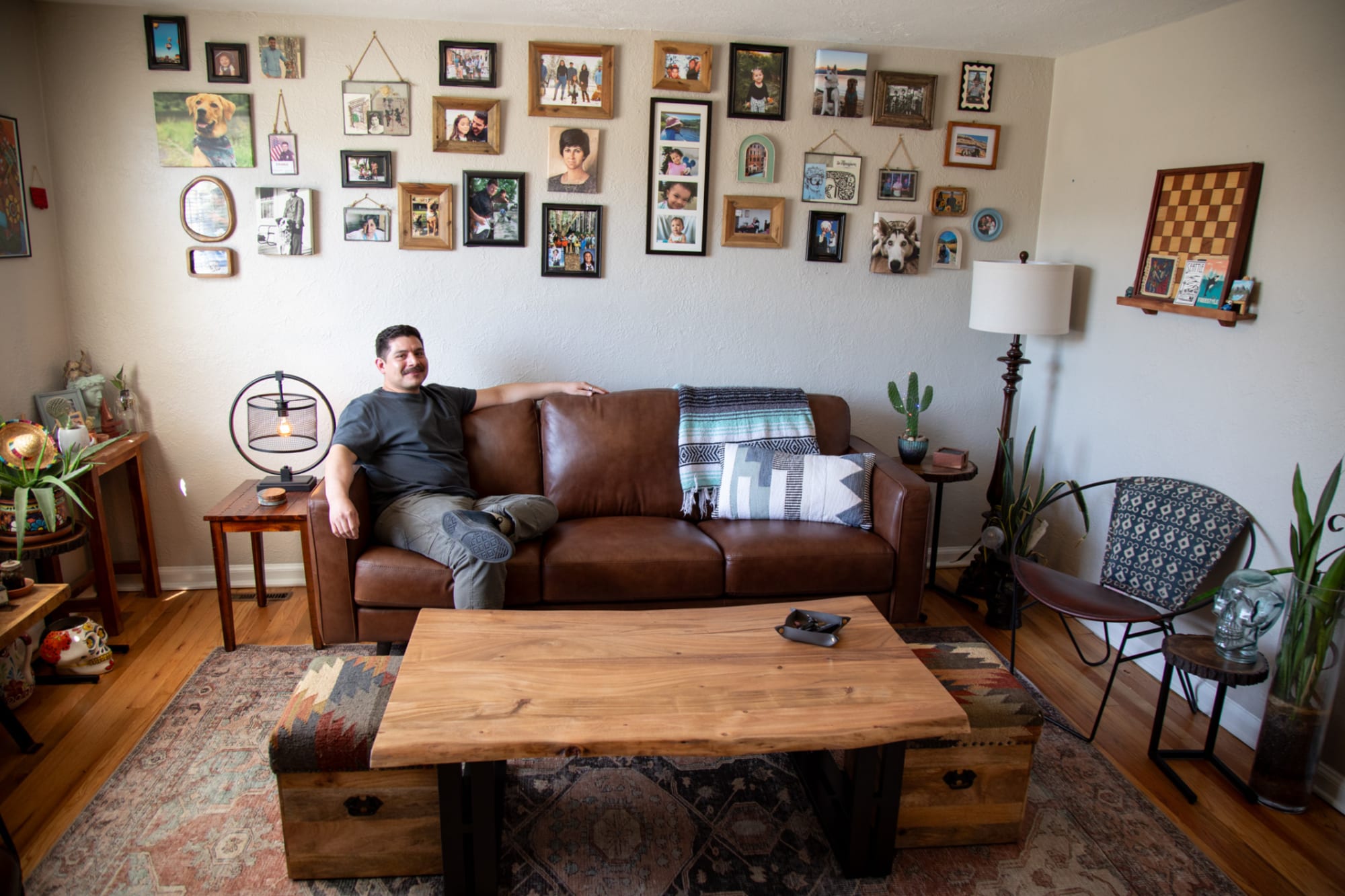 Man sitting on Tivoli sofa in home