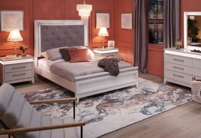 Glam Bedroom with bed that has a sparkle frame upholstered headboard
