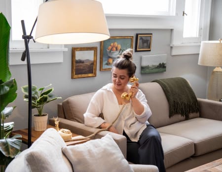 Real Spaces host, Haley, sitting on the Nouvelle sofa