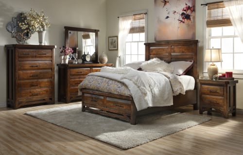 Rustic wood bedroom set featuring a panel bed, nightstand, dresser with mirror, and tall chest in a bedroom window scene