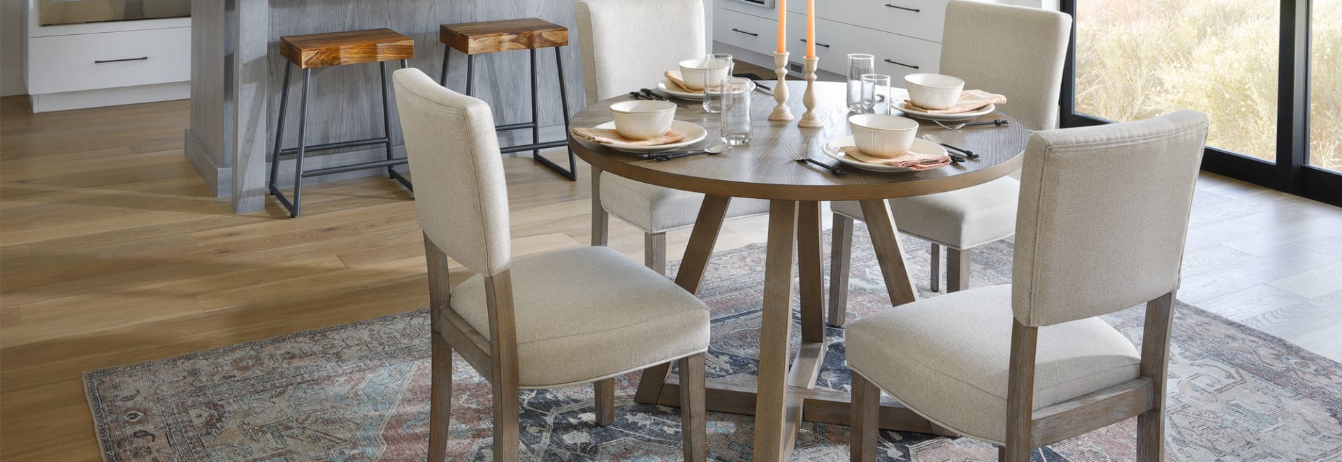Small Round Wooden Dining Table Set in Sunny Dining Room