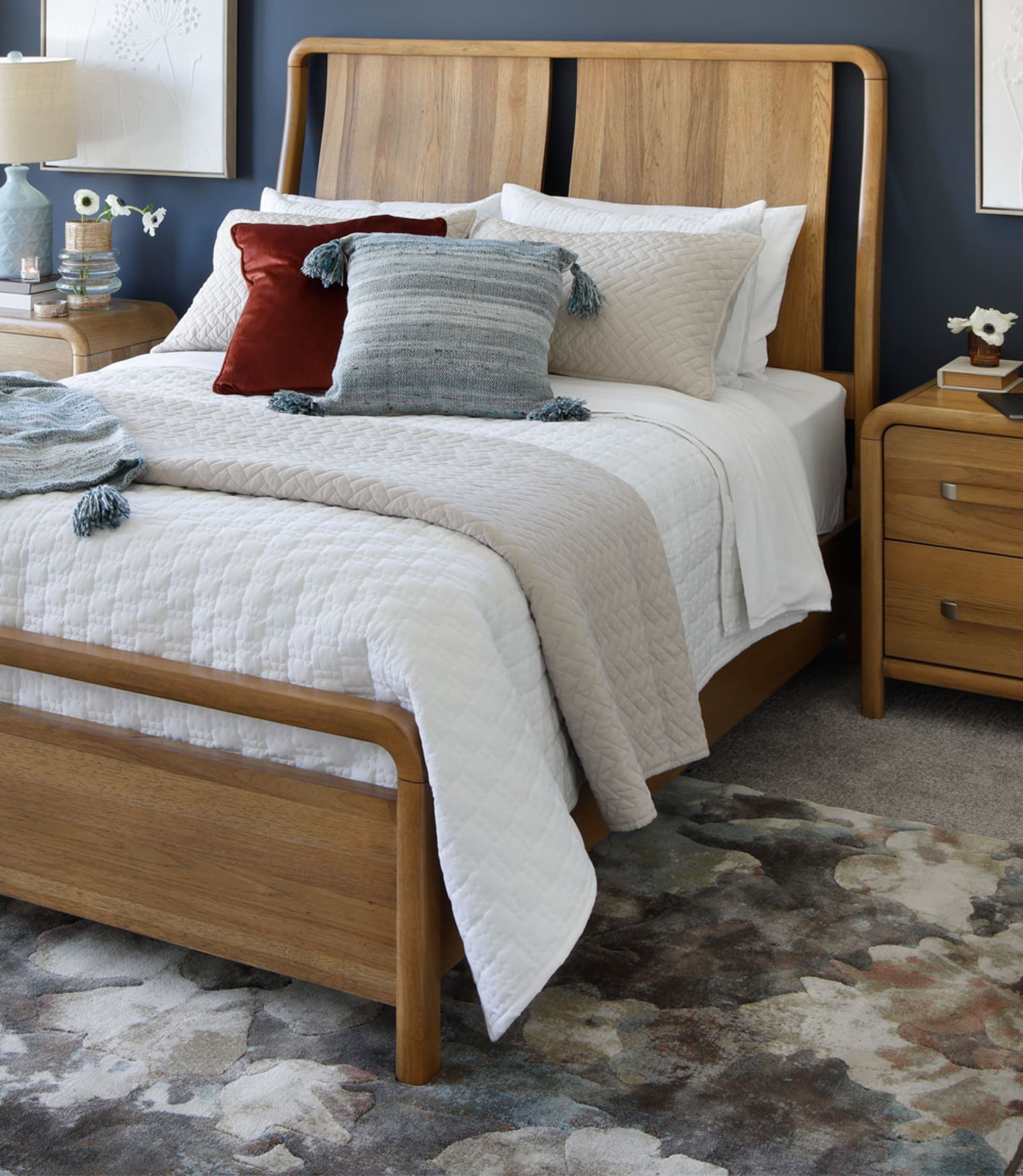 Light wood bedframe in bedroom