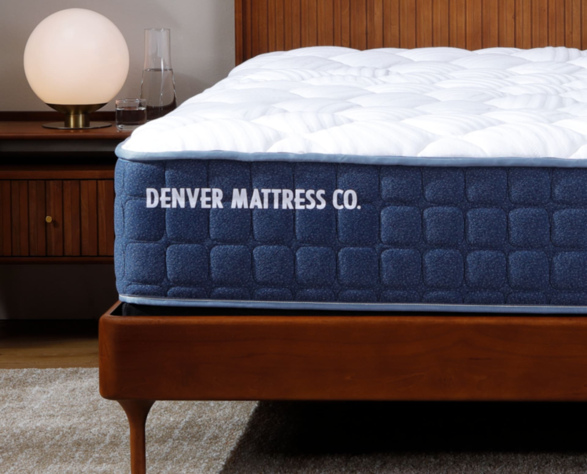 Denver Mattress Mattress in bedroom with Denver Mattress label as the focus