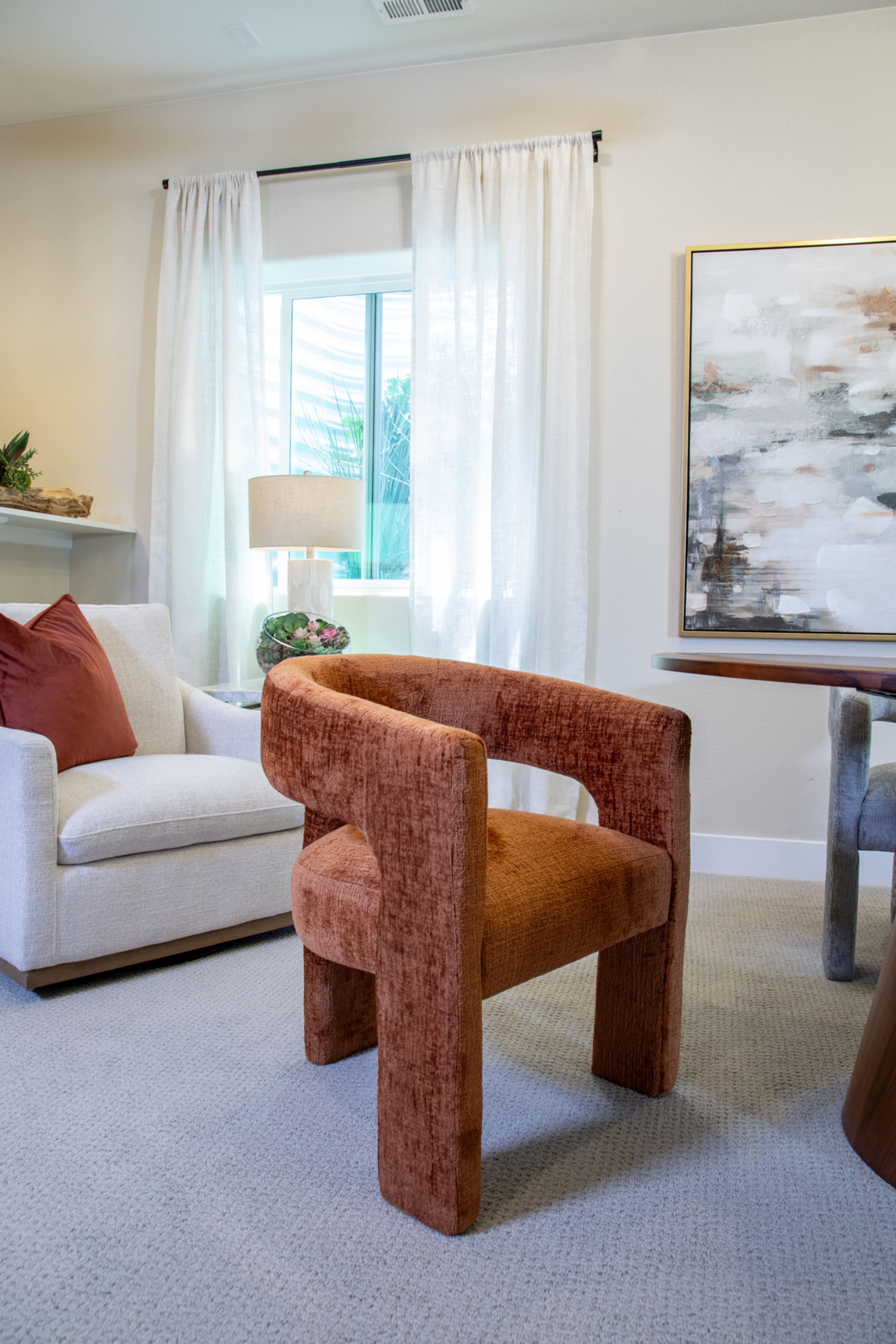 The red Nash Dining Chair in a dining space