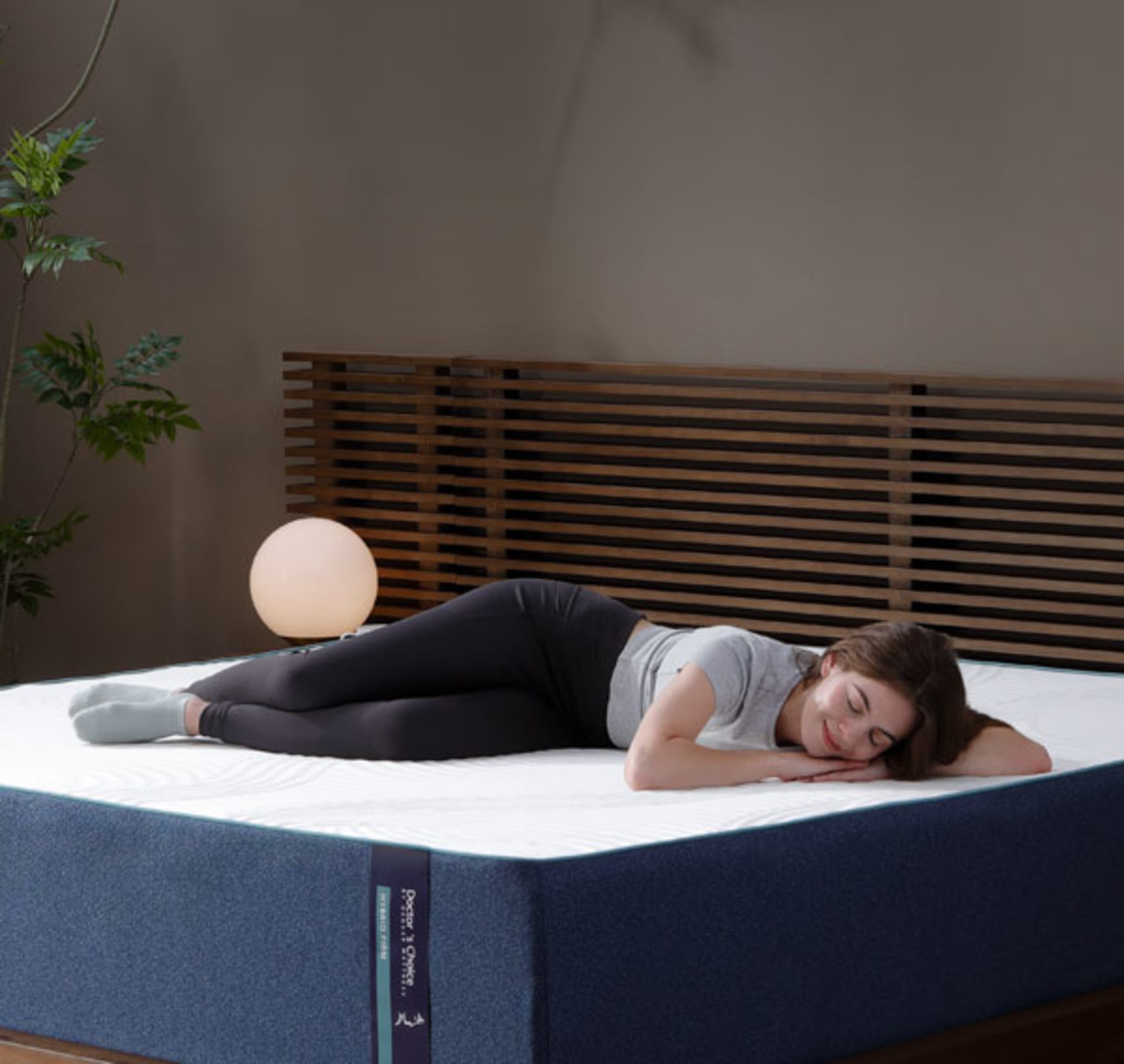 Woman Laying on Mattress with cooling fabric top