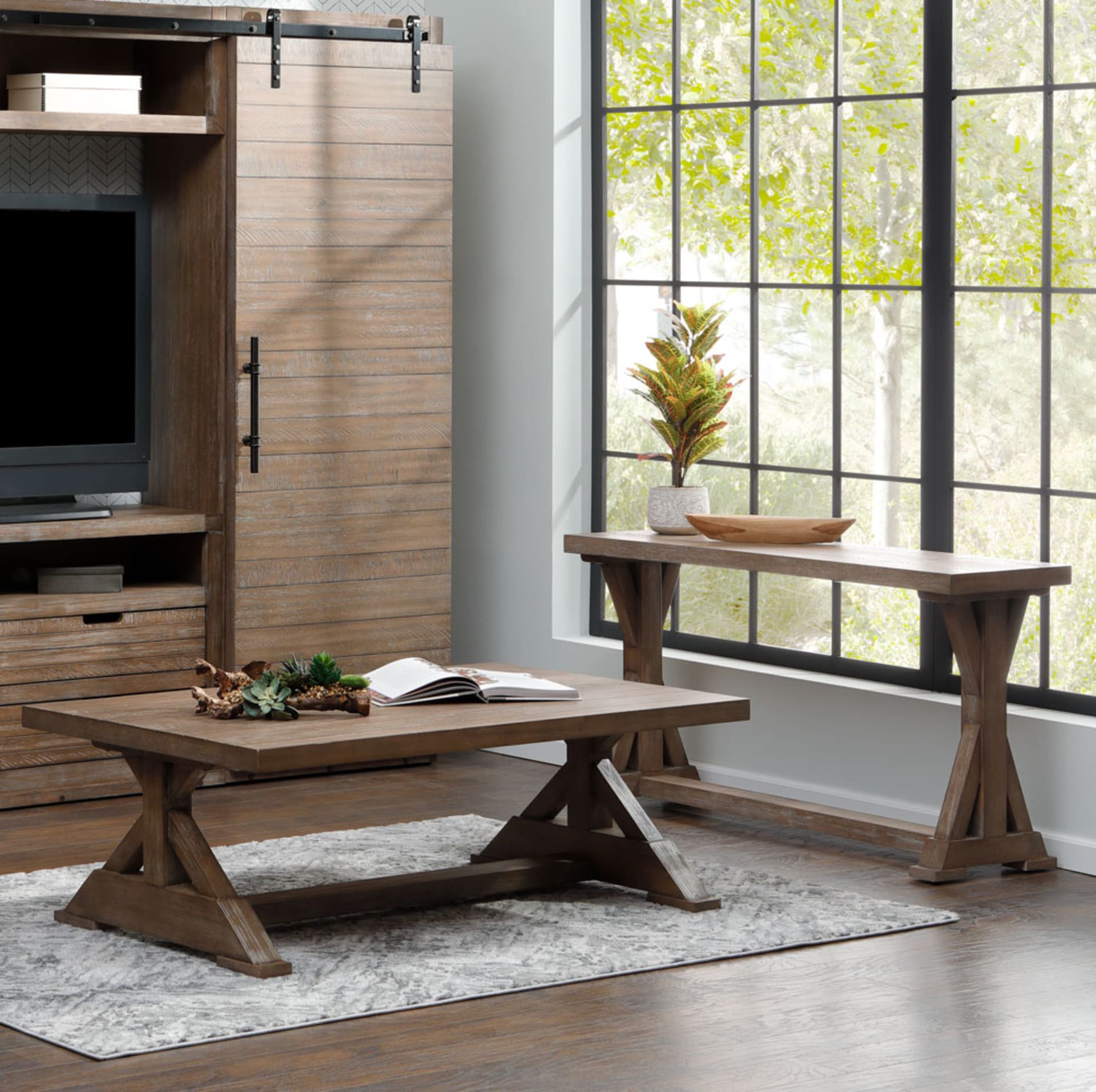 Mocha mousse colored entertainment center, coffee table, and sofa table in living room