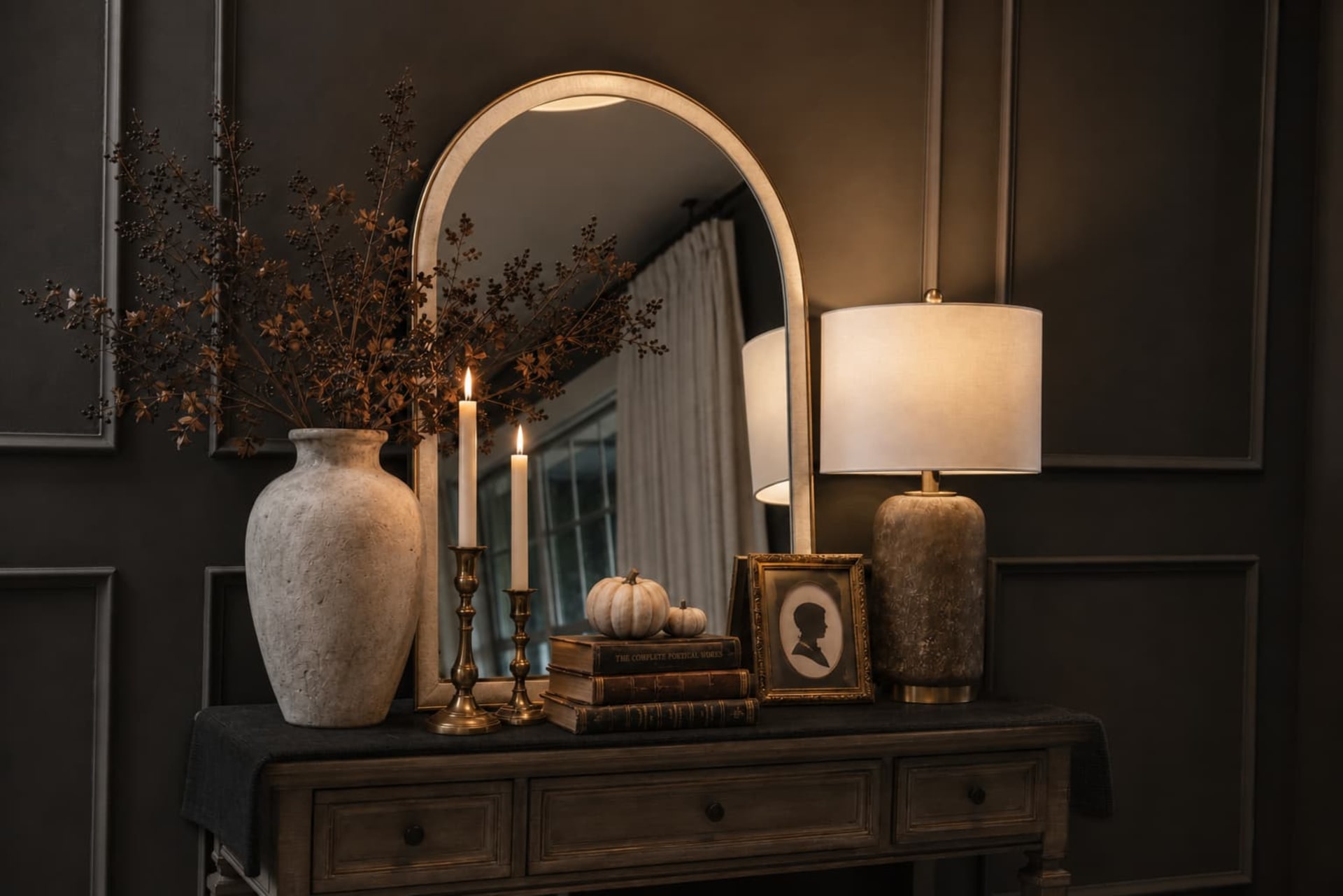 A wood sofa table with vintage Halloween Decor