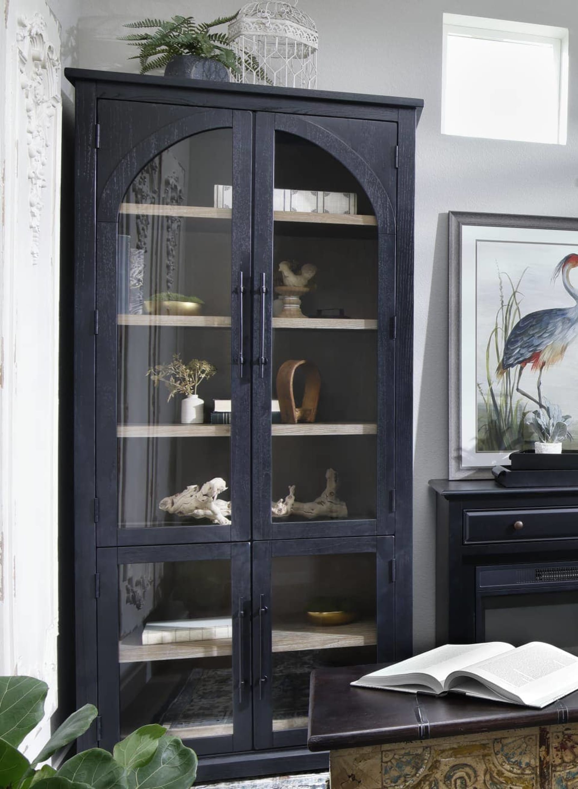 Arched cabinets in a maximalist room