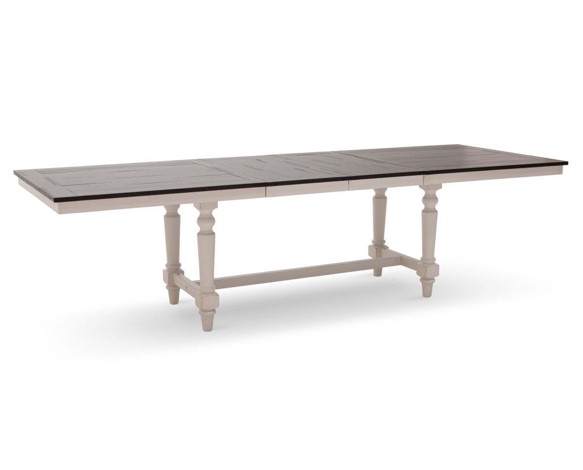 On white photograph of the Mountain Home Dining Table fully extended with leaf and rotated at slight angle