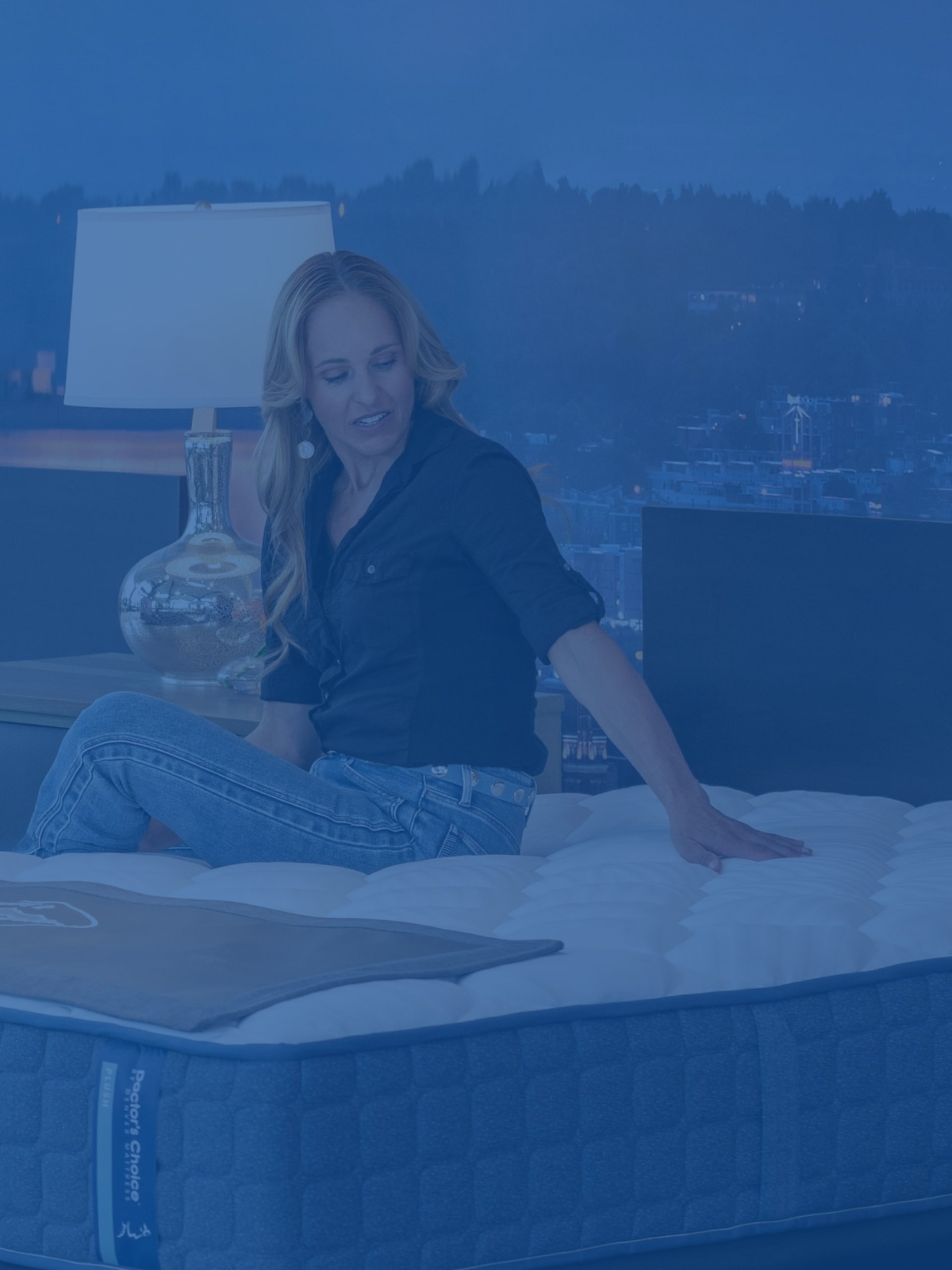 Woman shopping for mattress in store.