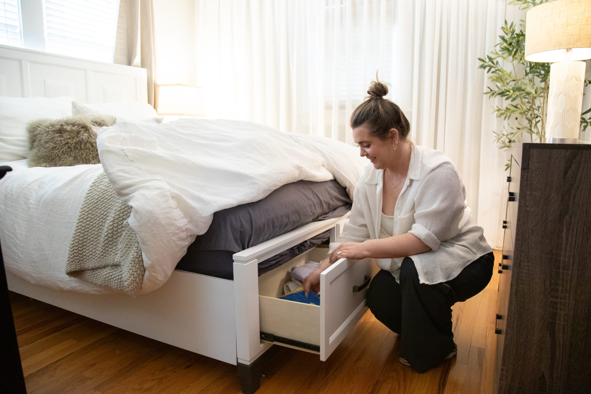 Real Spaces host, Haley, using her Mia Storage Bed