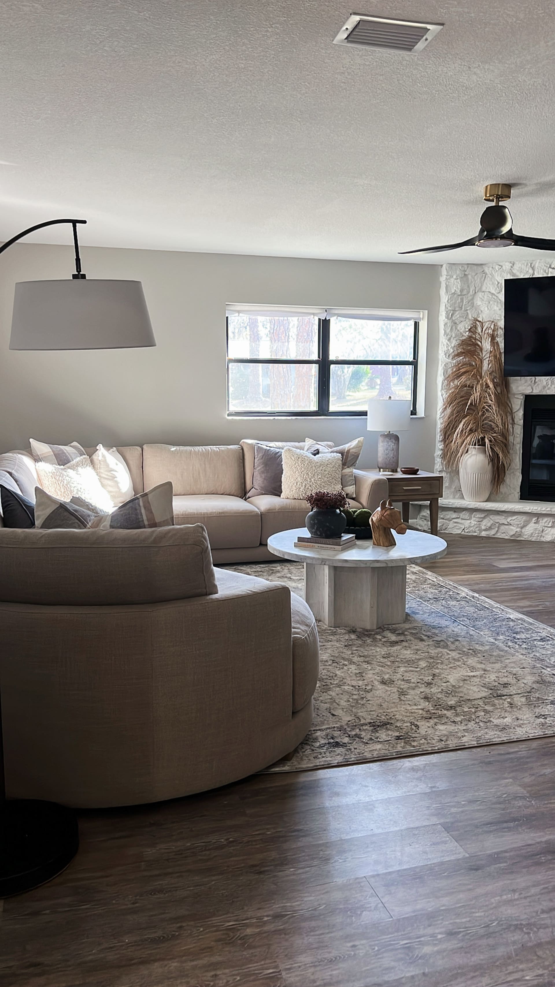 Kelli Bateman AirBnB family room wide shot featuring machine washable rug