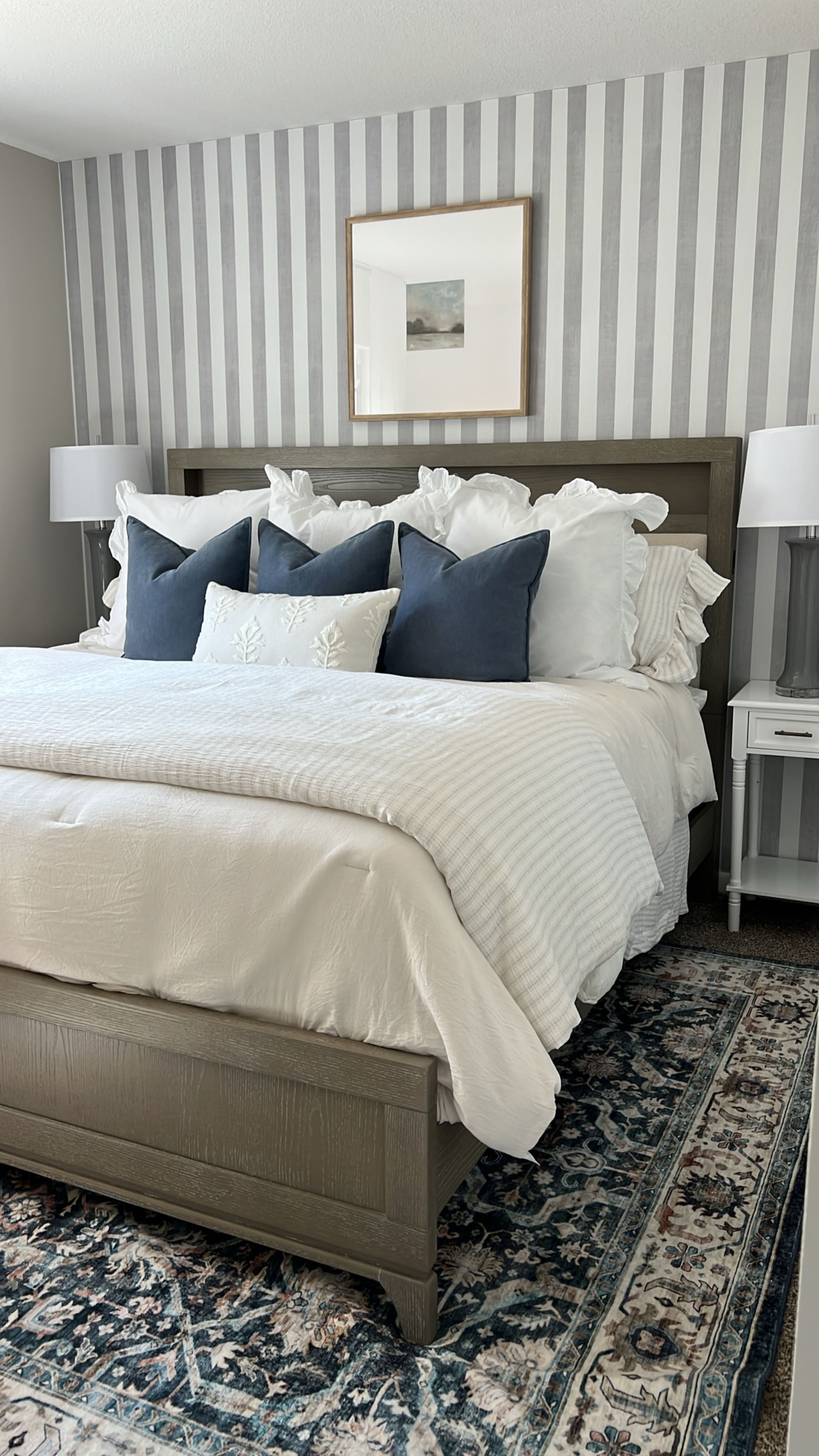 Kelli Bateman's Airbnb bedroom bed view with rug underneath