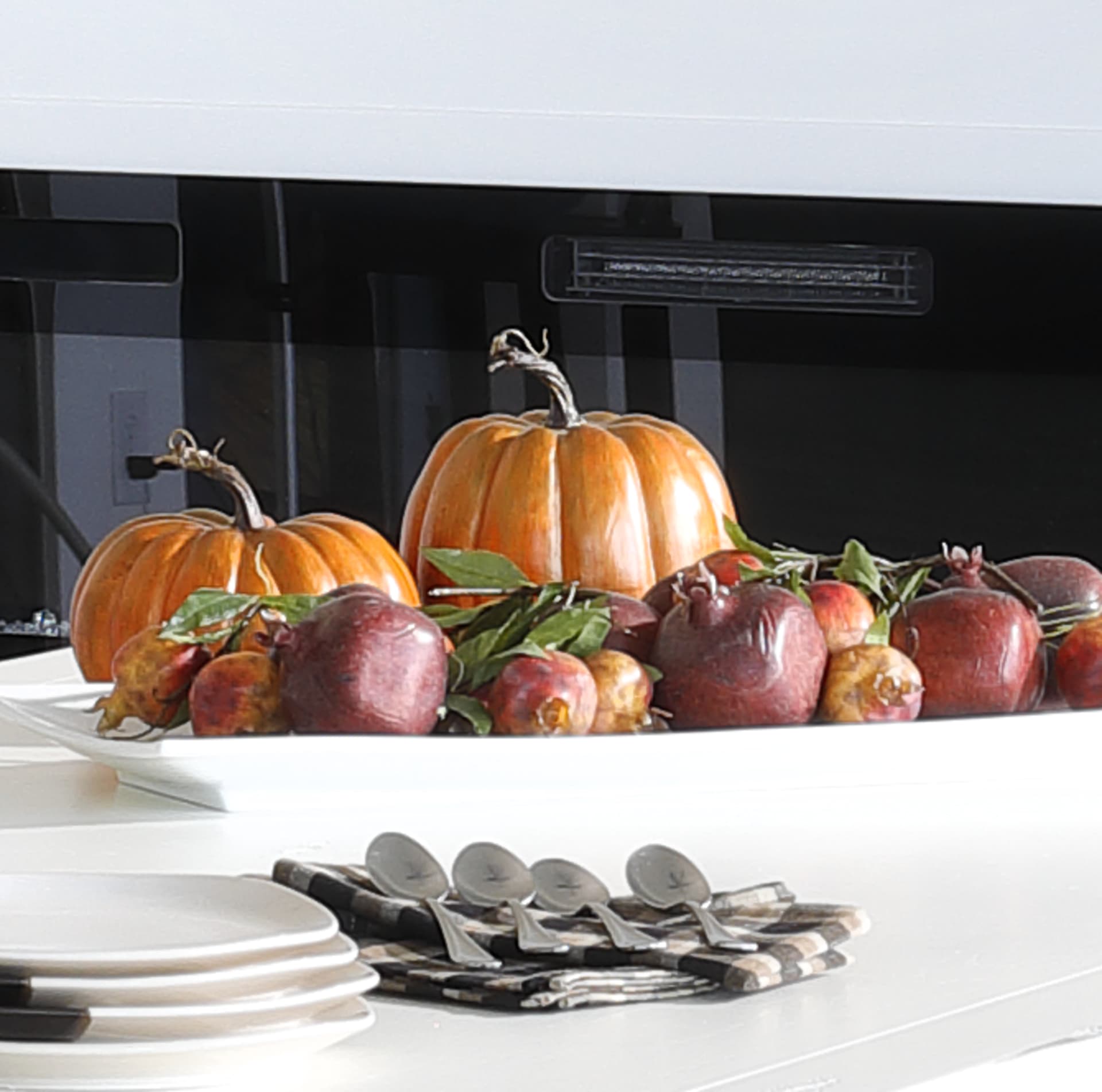 Red and orange fall decor on dining table
