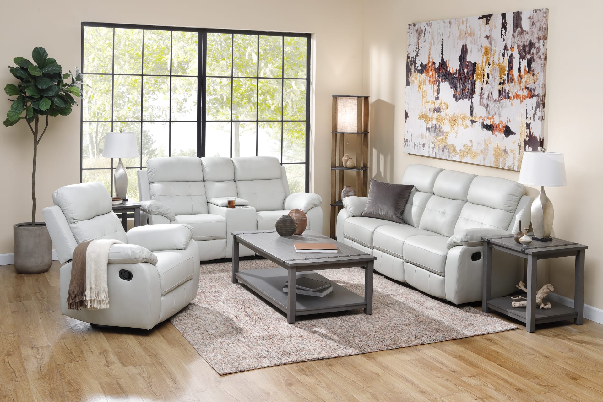Very light grey leather reclining sofa set.