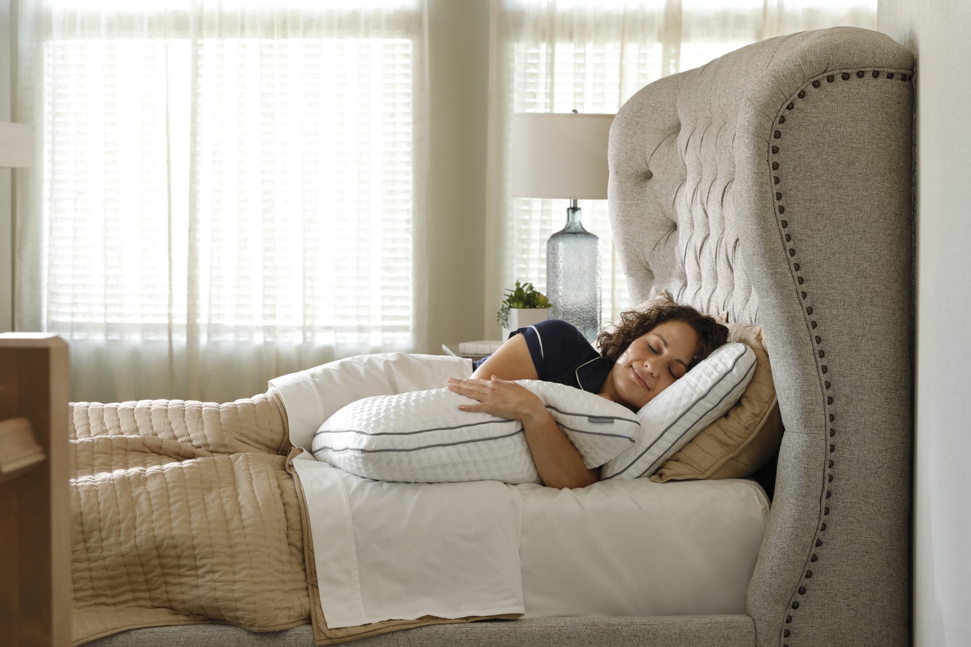Woman sleeping on Doctor's Choice Pillow