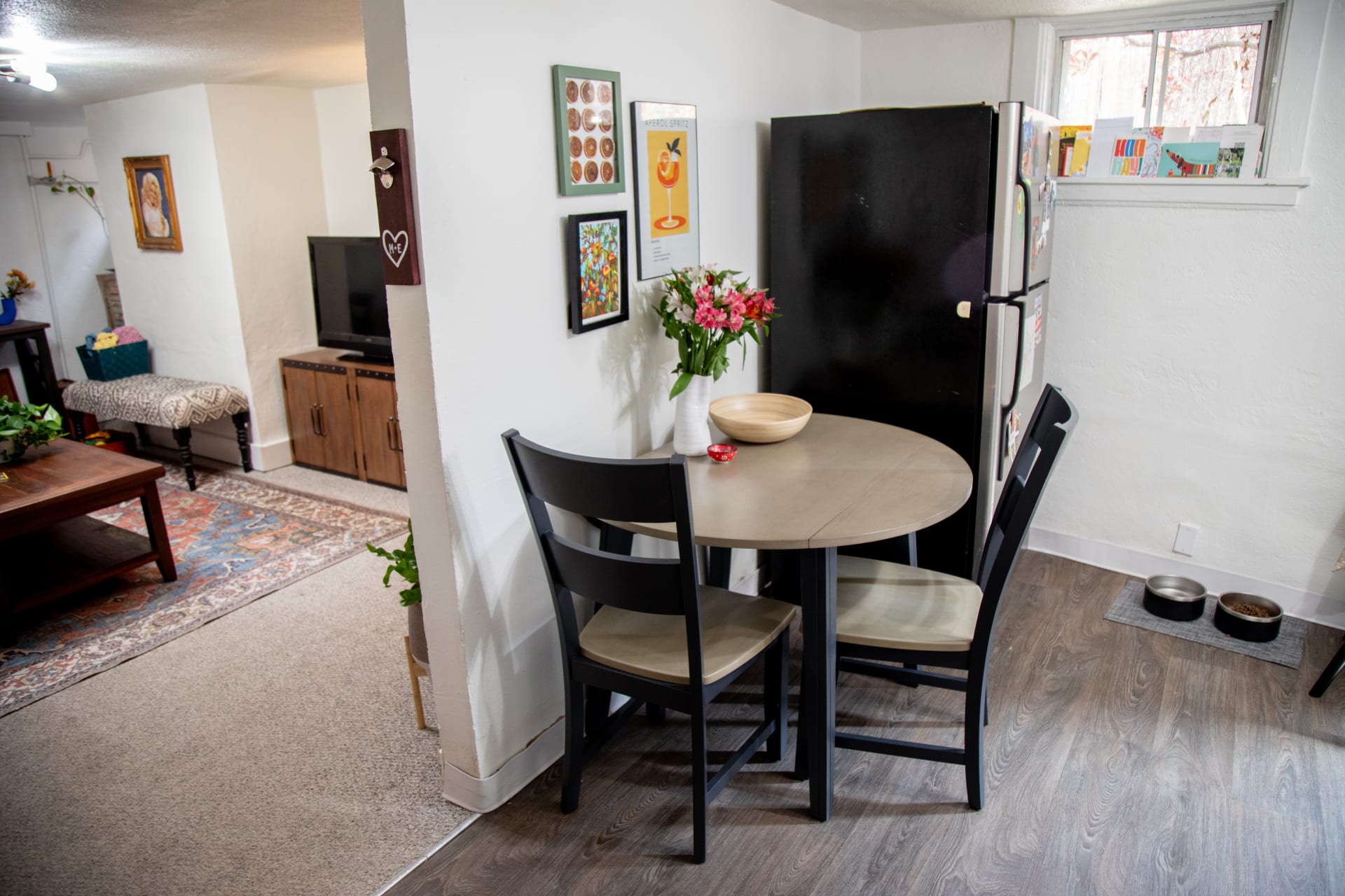 The Merrill Creek 3 Pc. Round Dining Room Set styled in Mackinley's apartment kitchen
